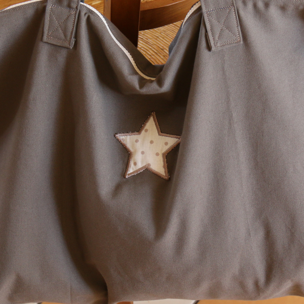 Détail de l'étoile en appliqué.