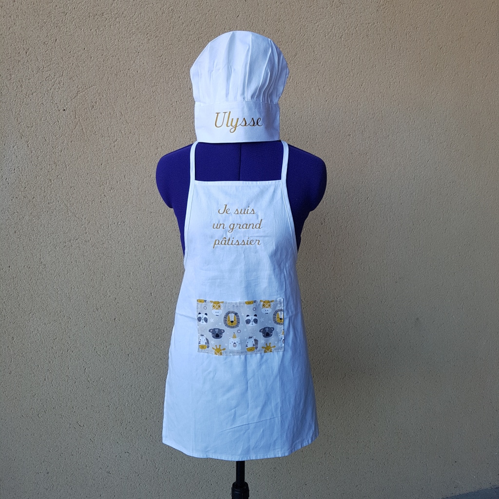 ensemble tablier et toque enfant 35€